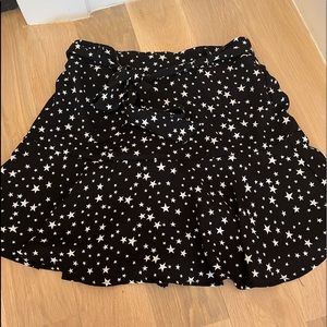 Super cute skirt with stars! TAGS STILL ON! Never worn, ties in front.